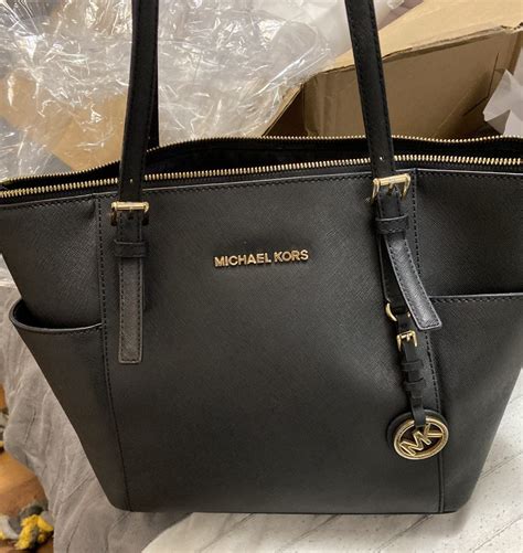 michael kors handbag repairs